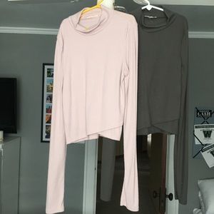 2 crop top, partial turtle necks. Pink and gray.